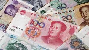 اليوان الصيني يقود مكاسب العملات قبل اتفاق التجارة الأمريكي 